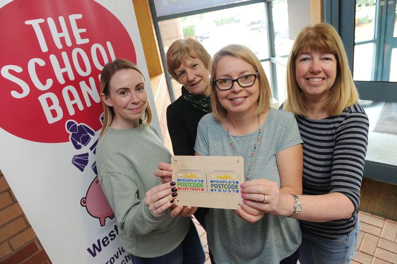 Postcode lottery award cheque photo schoolbank westlothian